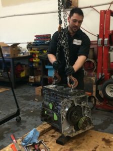 Ben working on Case 455 Reman Engine
